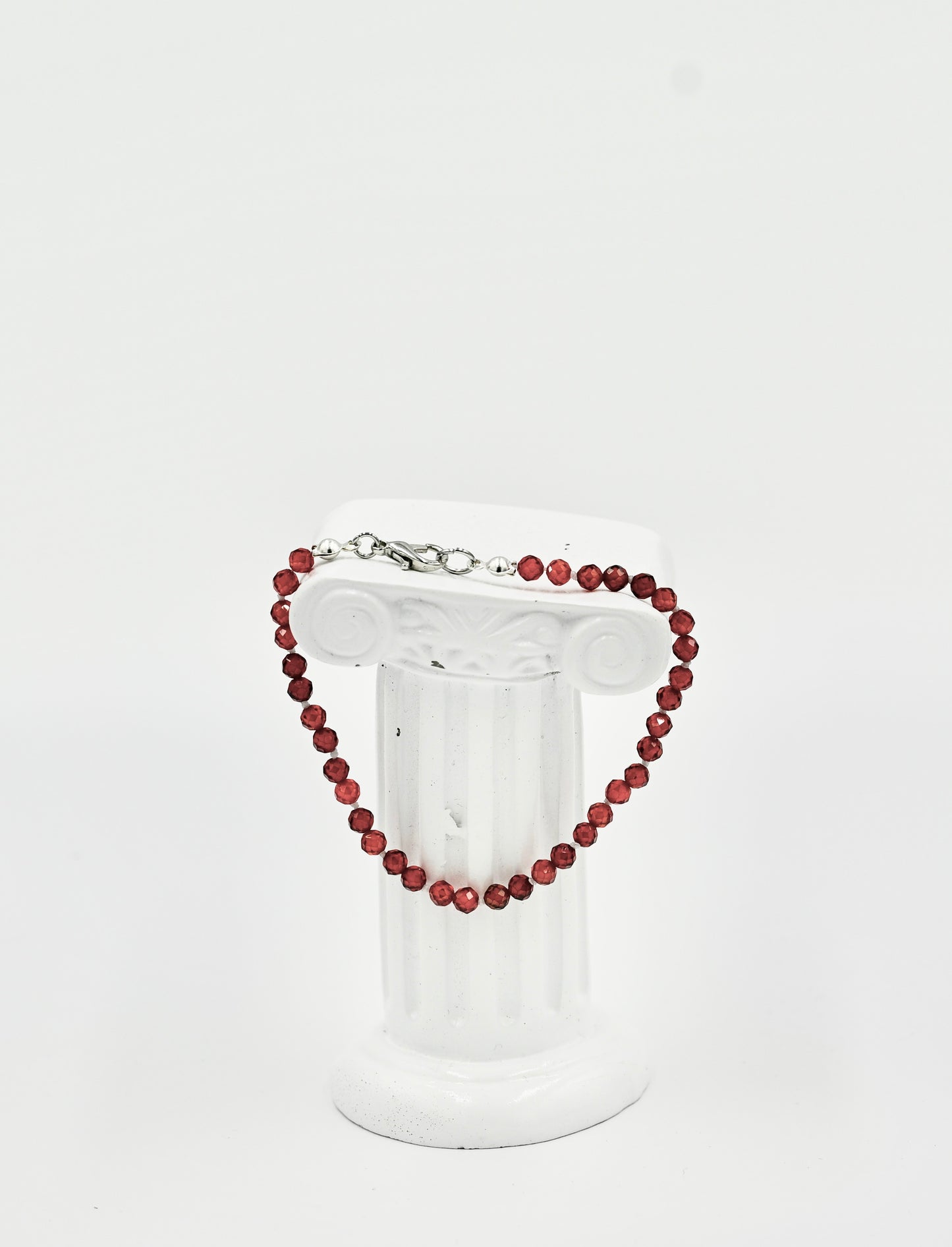 Orange Garnet Facet 7 Inch Knotted White Silk Bracelet Silver Hardware