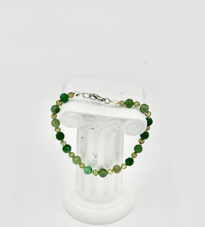 Facetted Aventurite 7 Inch Knotted White Silk Bracelet Silver Hardware