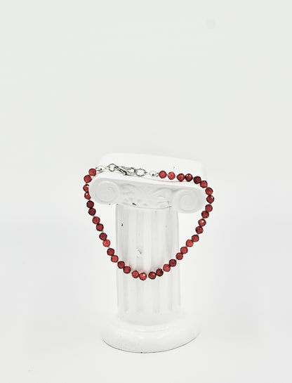 Orange Garnet Facet 7 Inch Knotted White Silk Bracelet Silver Hardware