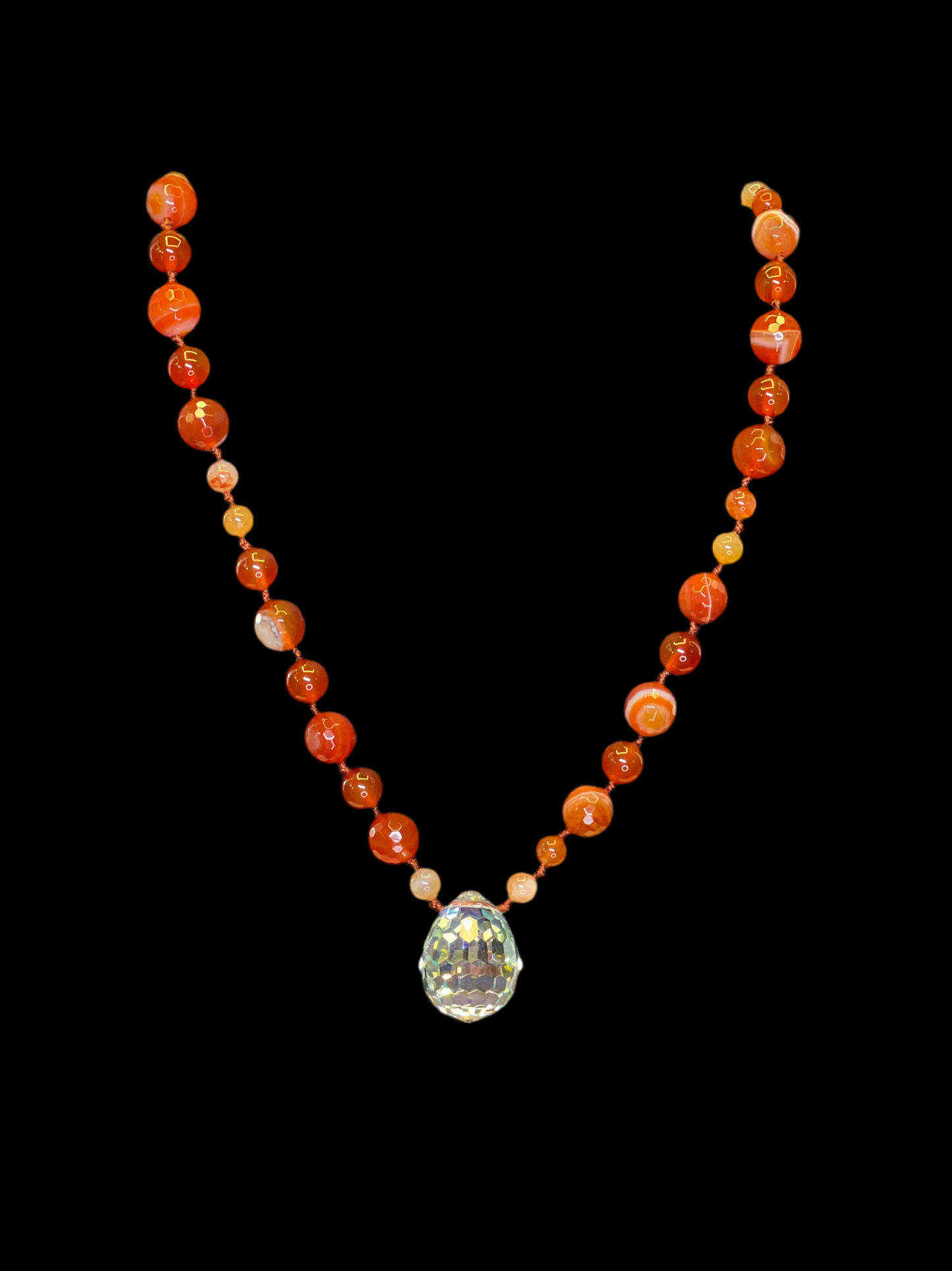 Sardonyx and Carnellian over Coral Knotted 27 inch Necklace Centered by a Lucky Crystal