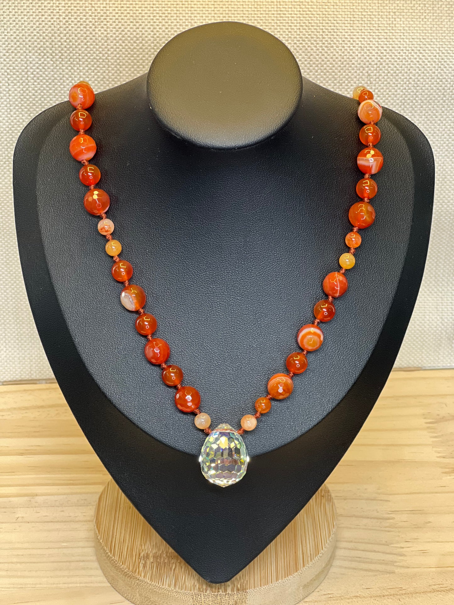 Sardonyx and Carnellian over Coral Knotted 27 inch Necklace Centered by a Lucky Crystal