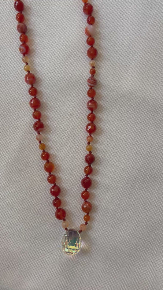 Sardonyx and Carnellian over Coral Knotted 27 inch Necklace Centered by a Lucky Crystal